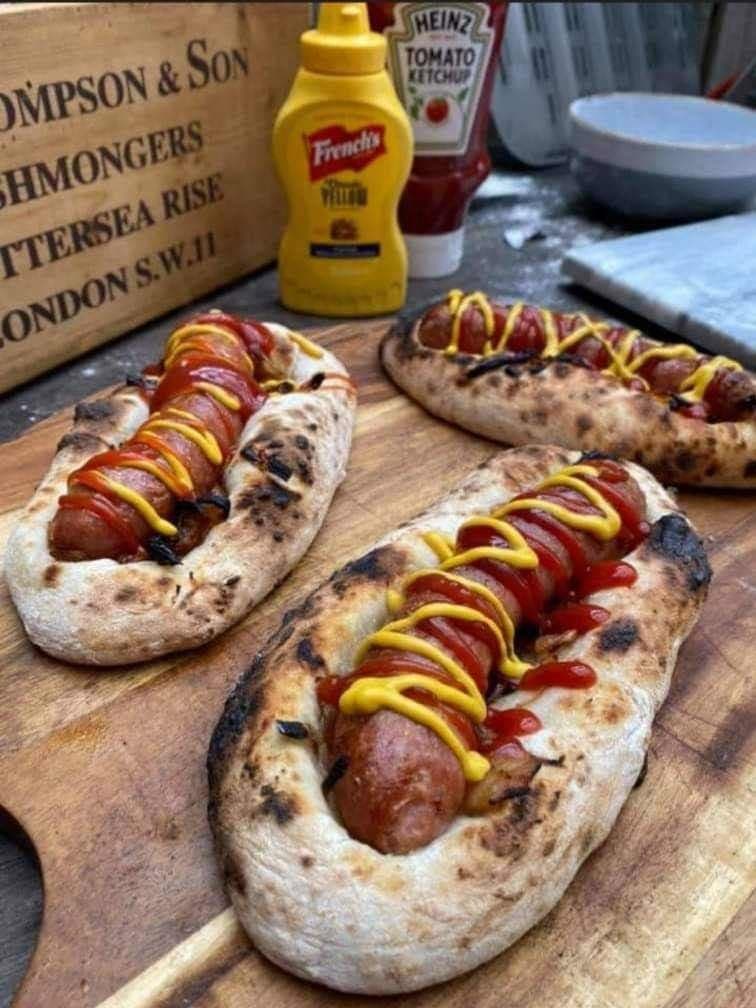 Stonebaked pizza dough wrapped around hot dogs with ketchup and mustard
